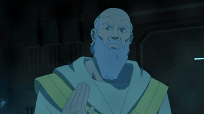 A Bald Man With A Long Beard And A Yellow Robe Holds Something In His Hand GIF