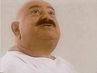 A Bald Man With A Mustache Is Eating A Sandwich From Subway GIF