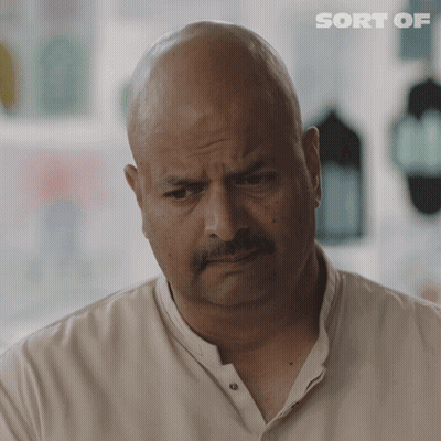 A Bald Man With A Mustache Is Shown With The Words Sort Of Behind Him GIF