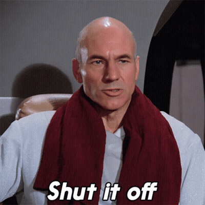 A Bald Man With A Scarf Around His Neck Is Saying Shut It Off GIF