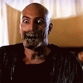 A Bald Man With A Skeleton Face And Teeth GIF