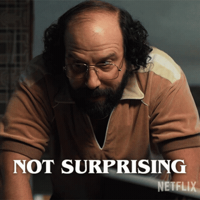 A Bald Man With Glasses And A Beard Says Not Surprising GIF