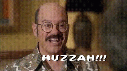 A Bald Man With Glasses And A Mustache Is Saying Huzzah !!! GIF