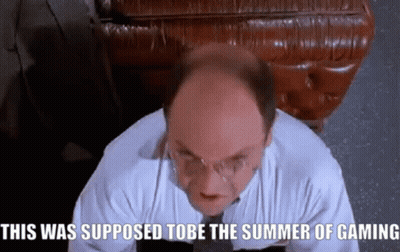 A Bald Man With Glasses Is Sitting In Front Of A Leather Couch And Says This Was Supposed To Be The Summer Of Gaming GIF