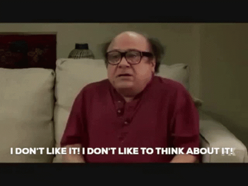 A Bald Man With Glasses Is Sitting On A Couch And Saying " I Don 'T Like It " GIF