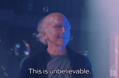 A Bald Man With Glasses Is Surrounded By Soap Bubbles And Says This Is Unbelievable . GIF