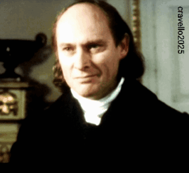 A Bald Man With Long Hair Looks At The Camera With The Year 2025 On The Bottom GIF