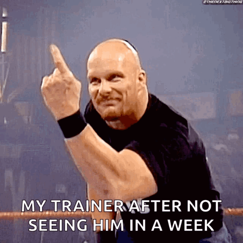 A Bald Wrestler Is Giving The Middle Finger While Saying " My Trainer After Not Seeing Him In A Week " GIF