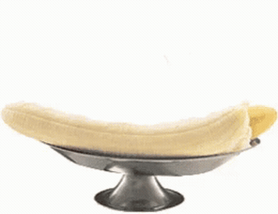 a banana split with three different flavors of ice cream and whipped cream