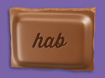 A Bar Of Chocolate Has The Word Hab Written On It GIF