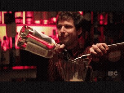 A Bartender Is Pouring A Drink Into A Blender With A Label That Says Ibc GIF