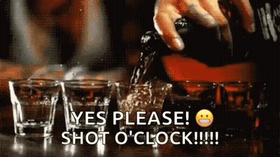 A Bartender Is Pouring A Shot Of Whiskey Into Shot Glasses GIF