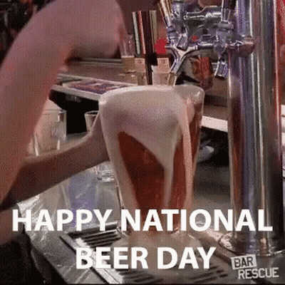 A Bartender Pouring Beer Into A Glass That Says Happy National Beer Day On It GIF