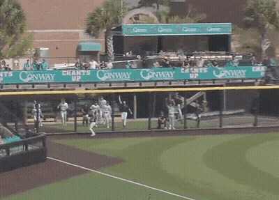 A Baseball Field With A Banner That Says " Conway " On It GIF