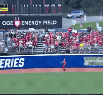 A Baseball Field With A Large Oge Energy Field Sign GIF