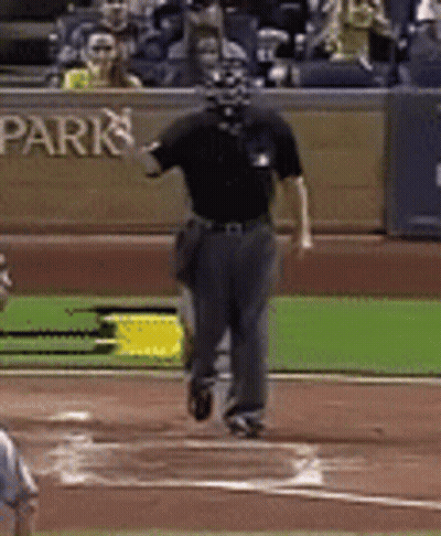 A Baseball Field With A Sign That Says Park In The Background GIF