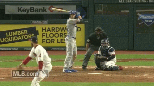 A Baseball Game Being Played In Front Of A Keybank Sign GIF