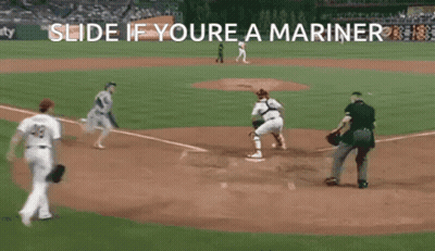 A Baseball Game Being Played With The Words Slide If Youre A Mariner GIF