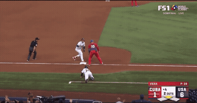 A Baseball Game Between Cuba And The Usa Is Being Played GIF