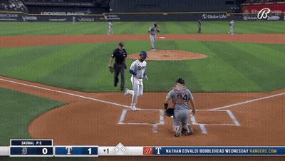 A Baseball Game Between The Dodgers And The Rangers Is Underway GIF
