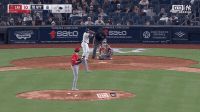 A Baseball Game Between The Yankees And The Dodgers Is Being Played GIF