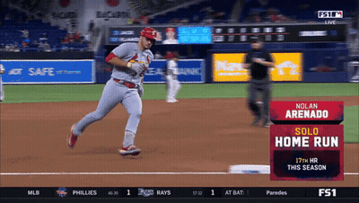 A Baseball Game Is Being Played And Nolan Arenado Is On The Field GIF