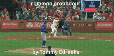 A Baseball Game Is Being Played At Busch Stadium And The Player At Bat Is Named Tommy Edreeks GIF