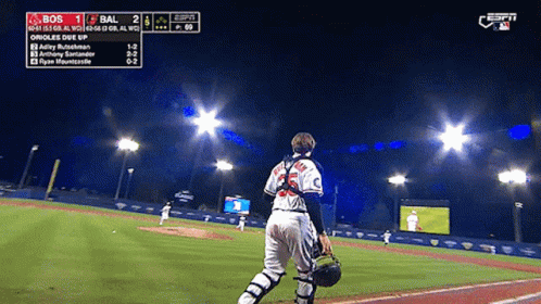 A Baseball Game Is Being Played At Night With The Score Being 1 To 2 GIF