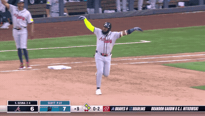 A Baseball Game Is Being Played Between Atlanta Braves And The Marlins GIF