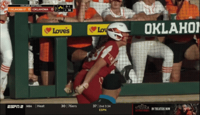 A Baseball Game Is Being Played Between Oklahoma St And College Softball GIF