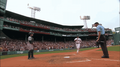 A Baseball Game Is Being Played In A Stadium With A Dell Ad On The Wall GIF