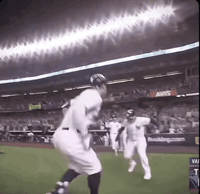 A Baseball Game Is Being Played In A Stadium With An Aws Advertisement GIF