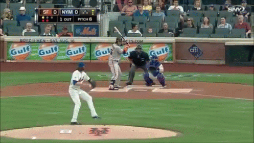 A Baseball Game Is Being Played In A Stadium With Gulf Advertisements On The Wall GIF