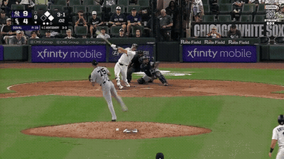 A Baseball Game Is Being Played In A Stadium With Xfinity Mobile Advertisements GIF