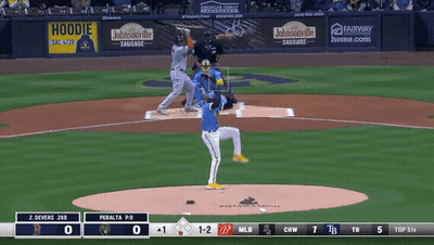 A Baseball Game Is Being Played In Front Of A Banner That Says Johnsonville Sausage GIF