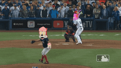 A Baseball Game Is Being Played In Front Of A Banner That Says Music GIF