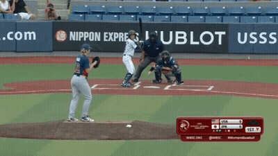 A Baseball Game Is Being Played In Front Of A Banner That Says Nippon Express GIF