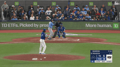 A Baseball Game Is Being Played In Front Of A Banner That Says Td Etfs GIF