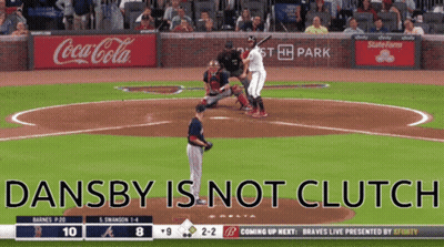 A Baseball Game Is Being Played In Front Of A Coca-Cola Ad GIF