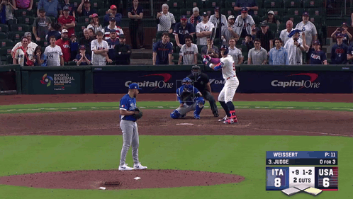A Baseball Game Is Being Played In Front Of A Crowd And The Score Is 8 To 6 GIF