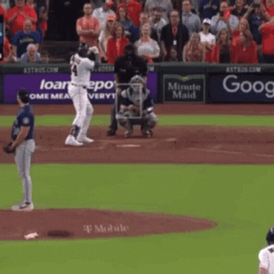 A Baseball Game Is Being Played In Front Of A Crowd Sponsored By Minute Maid And T Mobile GIF