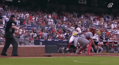 A Baseball Game Is Being Played In Front Of A Crowd With A Hyundai Sign In The Stands GIF