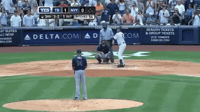 A Baseball Game Is Being Played In Front Of A Delta Com Banner GIF