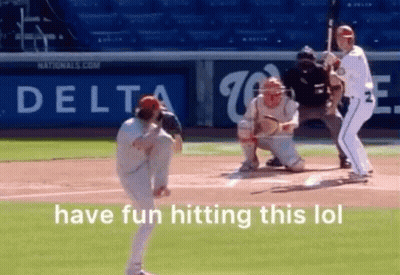 A Baseball Game Is Being Played In Front Of A Delta Sign . GIF