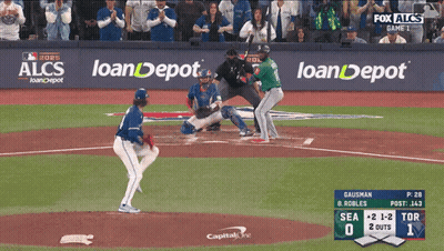 A Baseball Game Is Being Played In Front Of A Fox Alcs Banner GIF