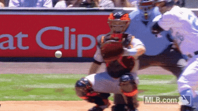 A Baseball Game Is Being Played In Front Of A Mlb.com Banner GIF