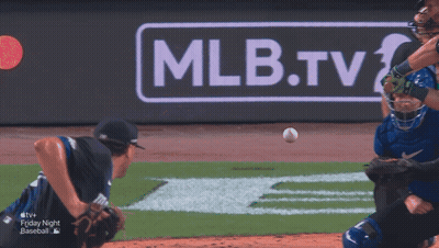 A Baseball Game Is Being Played In Front Of A Mlb.tv Sign GIF