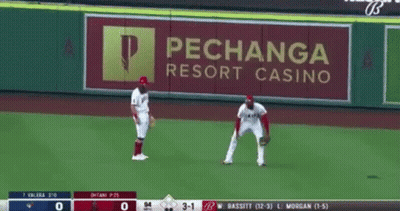 A Baseball Game Is Being Played In Front Of A Pechanga Resort Casino Banner GIF