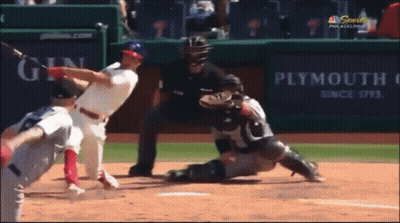 A Baseball Game Is Being Played In Front Of A Plymouth Advertisement GIF