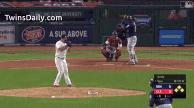 A Baseball Game Is Being Played In Front Of A Sign That Says A Sup Above GIF